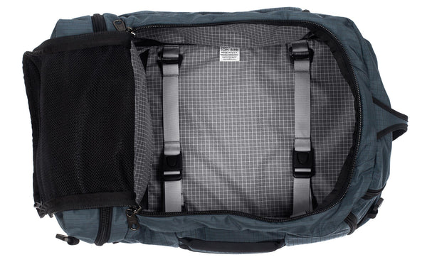 An open Techonaut 45 with a Night Walk (dark grey blue) exterior Halcyon and a Northwest Sky (grey) interior.